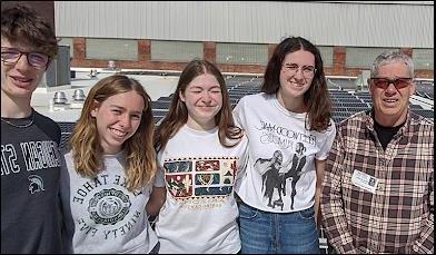 four students and faculty advisor, PHS solar club